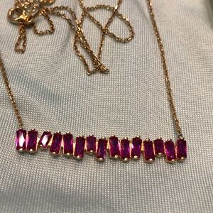 Eye Candy 19" Goldtone necklace with row of pink stones